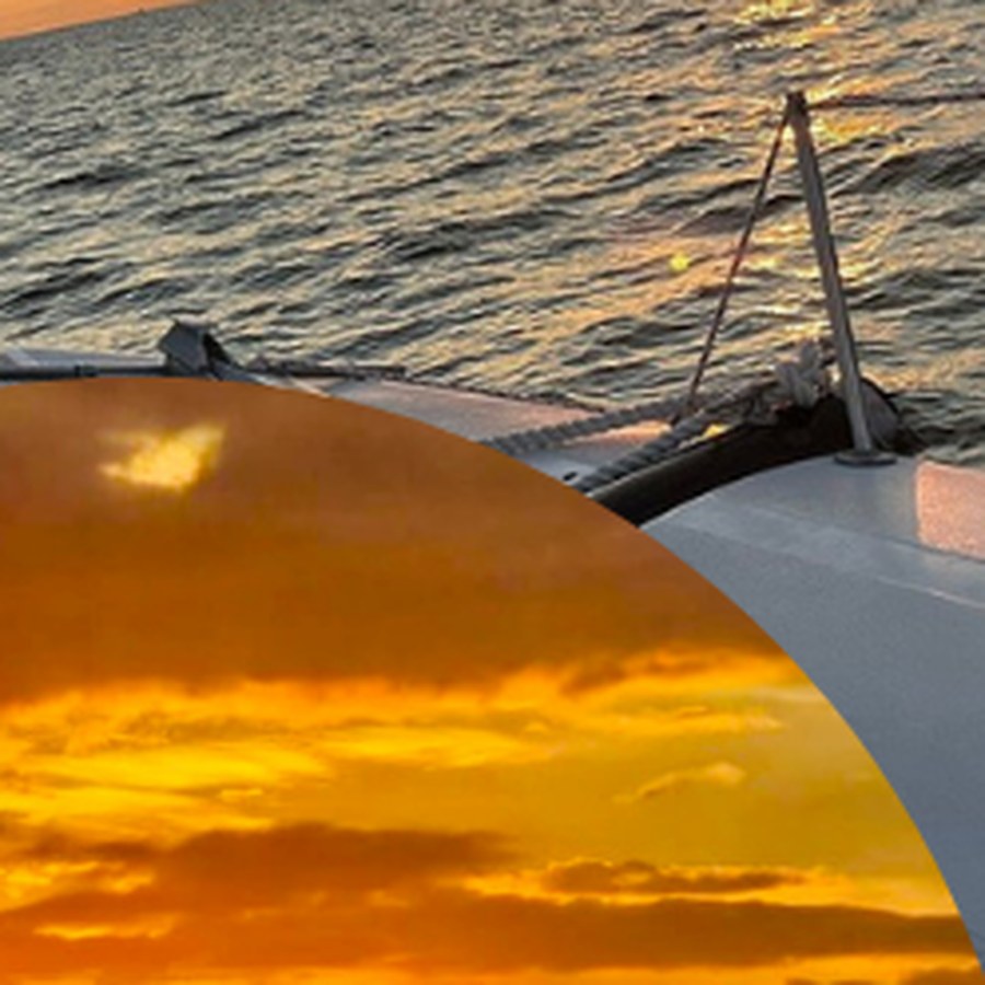 Sunset over the water from a catamaran off Ambergris Caye, Belize